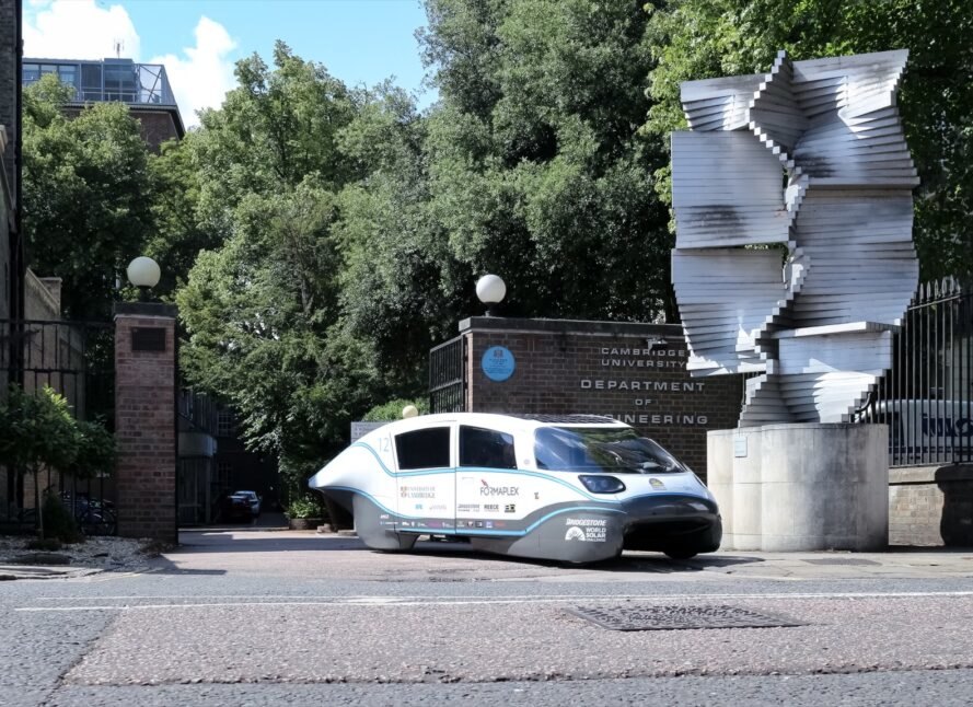 parked white solar-powered electric car